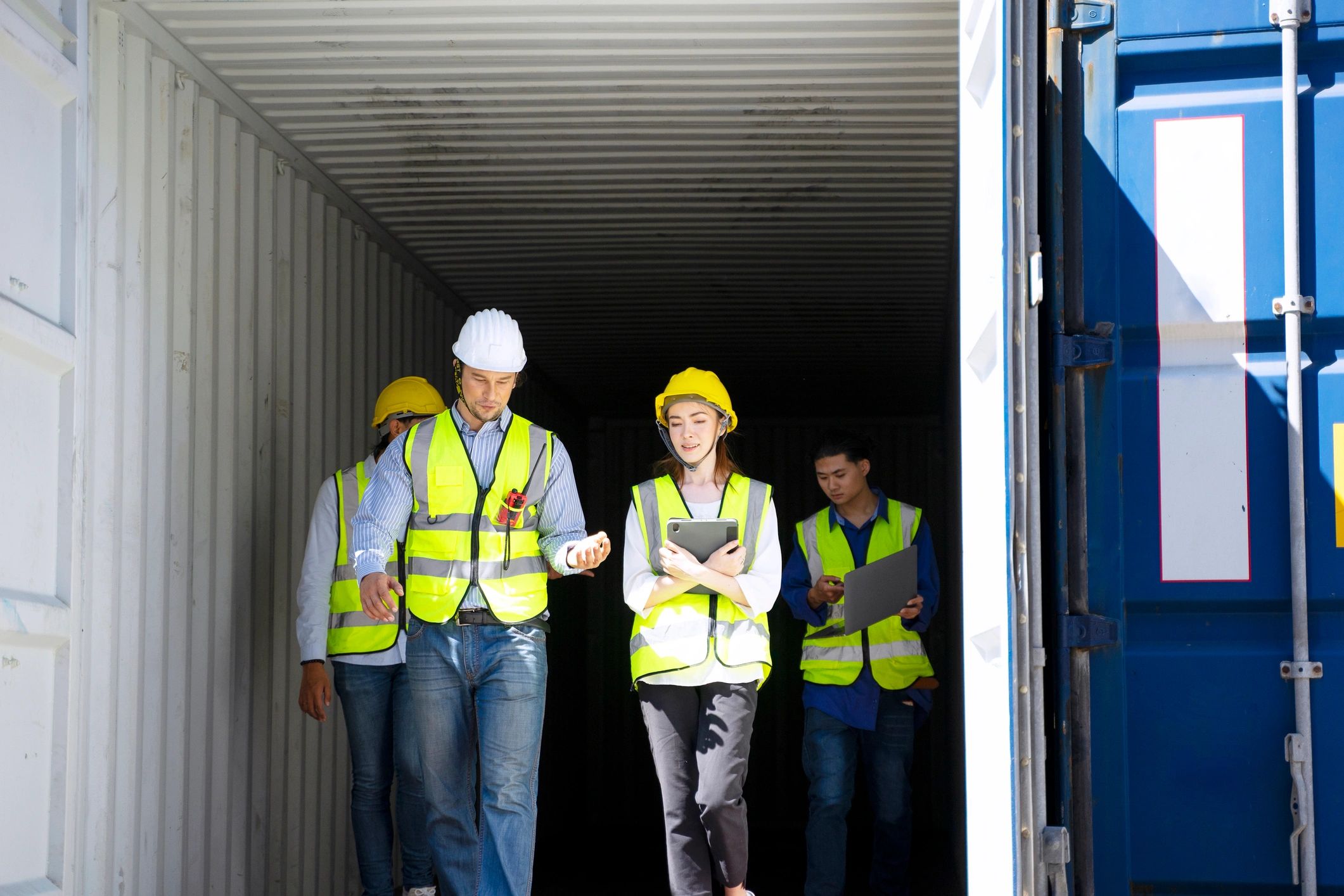 Worker at container warehouse representing international trade operations