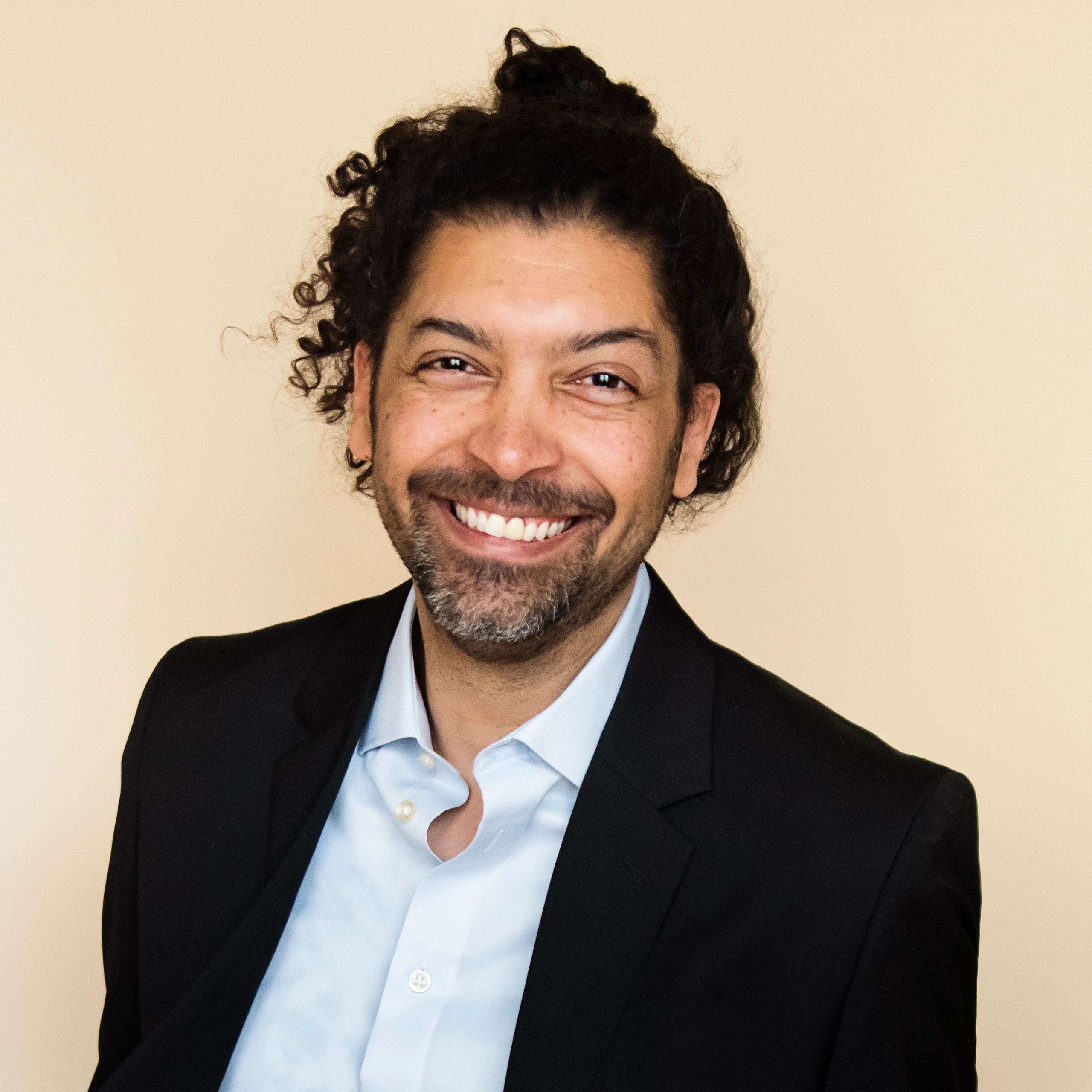 Professional headshot representing market strategy lead