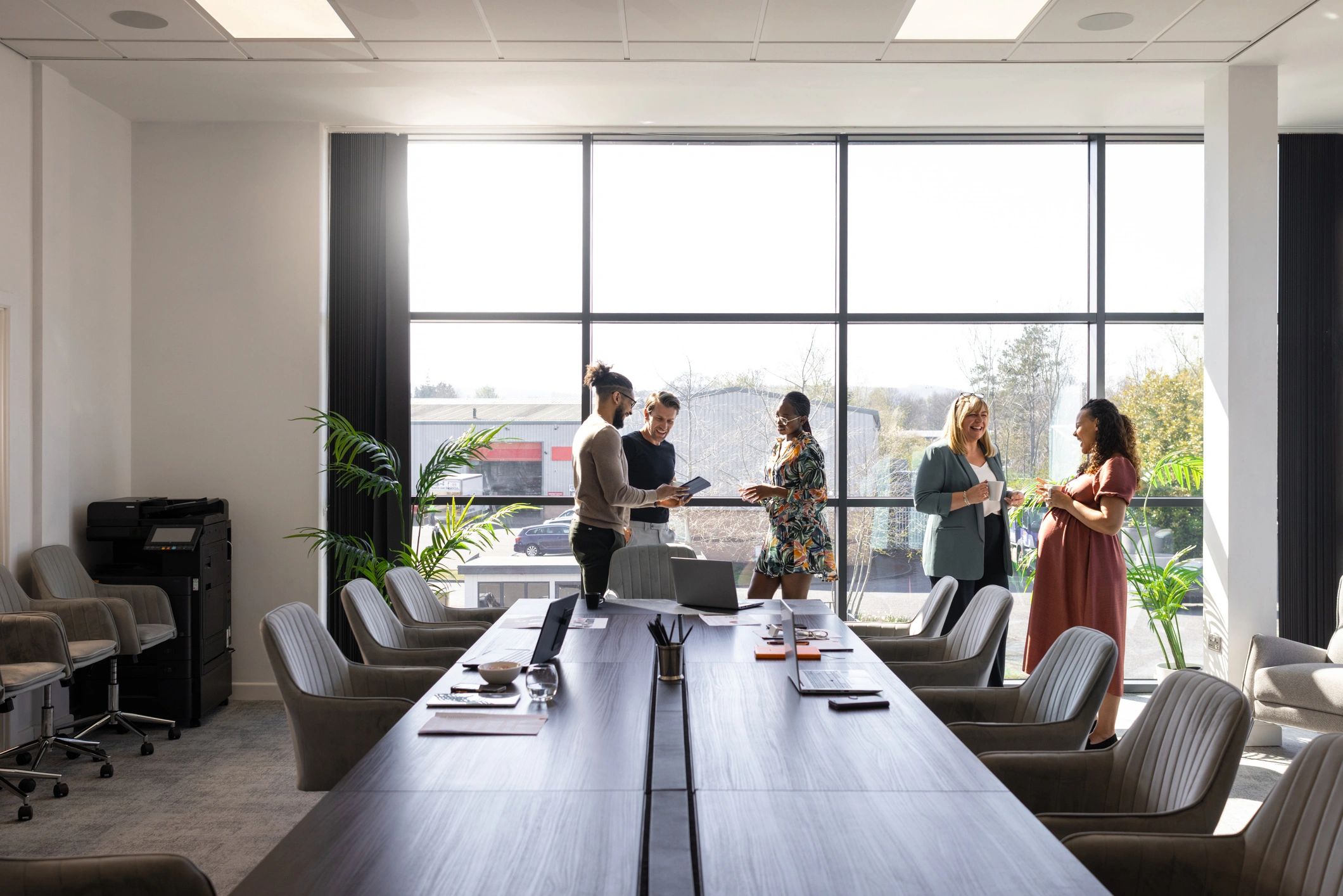 Professional trade consulting team meeting in a modern office