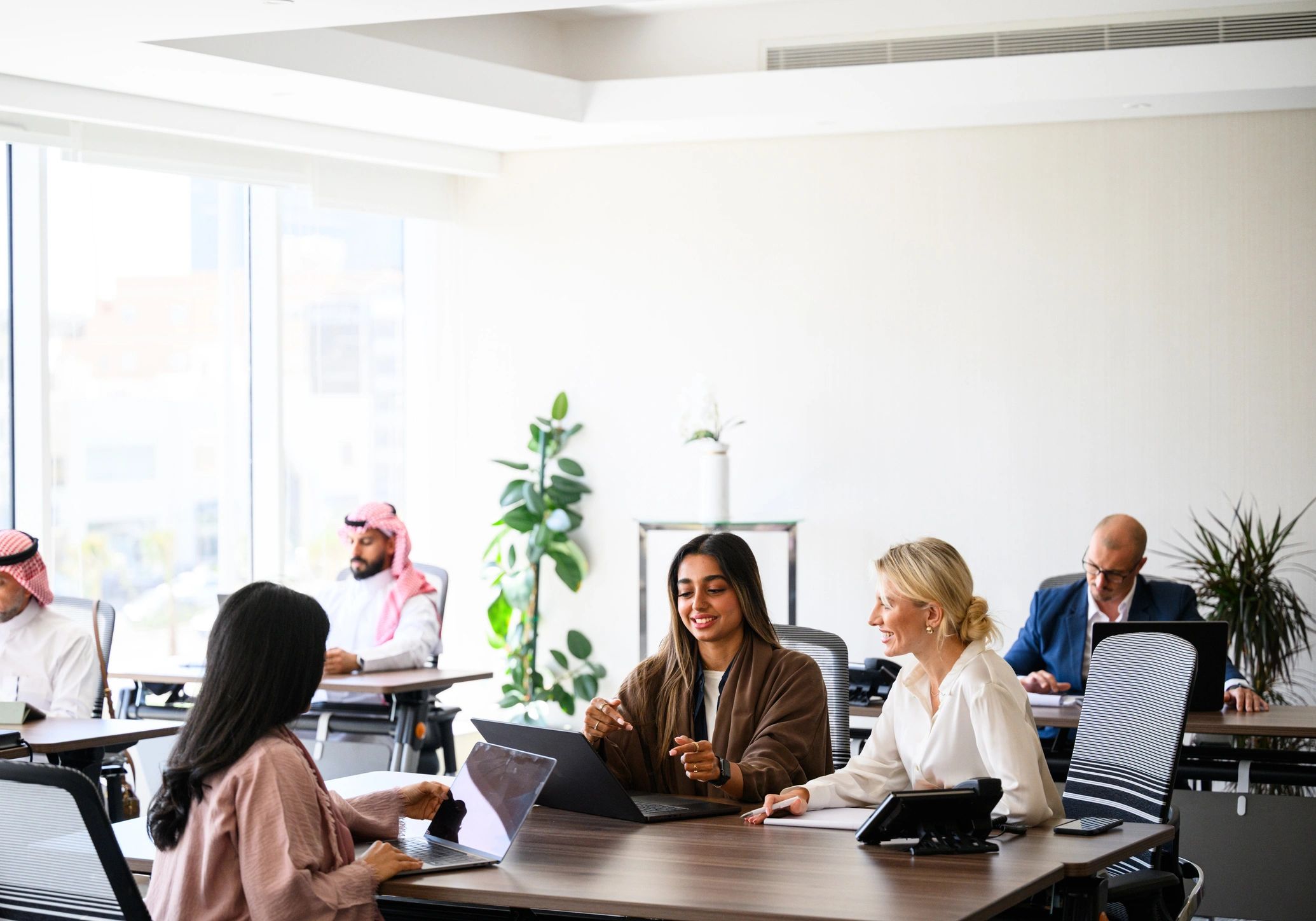 Professional team member in a collaborative workspace